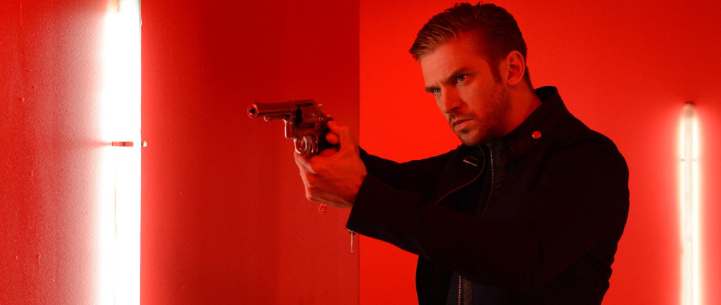 The Guest - Dan Stevens, red background