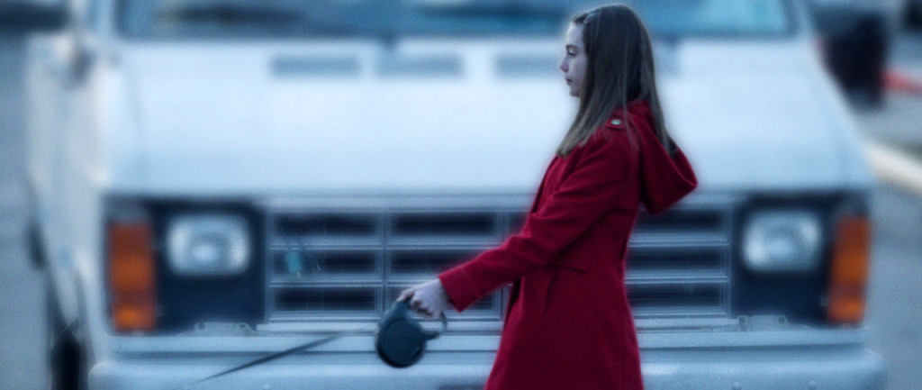 A Walk Among the Tombstones - red coat girl and van
